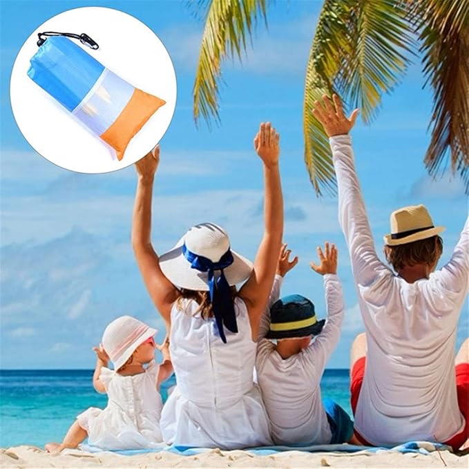 Bright orange and blue ECOTREK beach mat, sandproof and waterproof, measuring 210x200 cm, laid out on the beach.