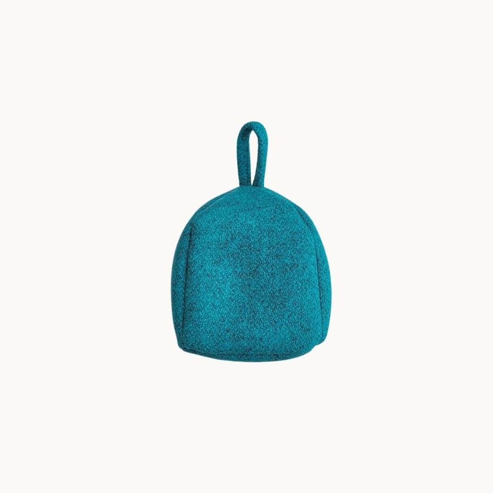 Felted New Zealand wool door stop by Do Not Disturb Sleep Company, plush and decorative for holding doors open.