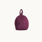 Felted NZ wool door stop by Do Not Disturb Sleep Company, designed to hold doors open, featuring a soft, textured wool finish.