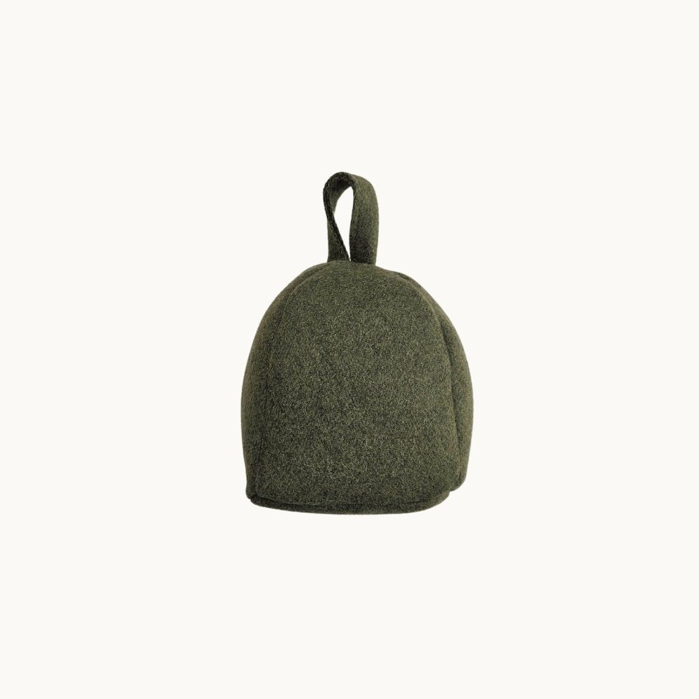 Felted NZ wool door stop by Do Not Disturb Sleep Company, showcasing its soft, textured felted wool design for door stability.