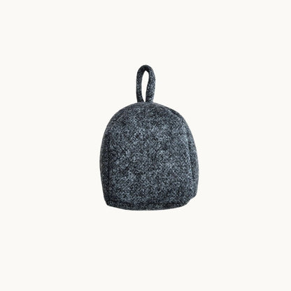 Felted NZ wool door stop by Do Not Disturb Sleep Company, soft textured door accessory for preventing door movement.