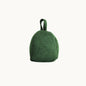 Felted New Zealand wool door stop by Do Not Disturb Sleep Company, shaped like a cozy, handcrafted door prop.