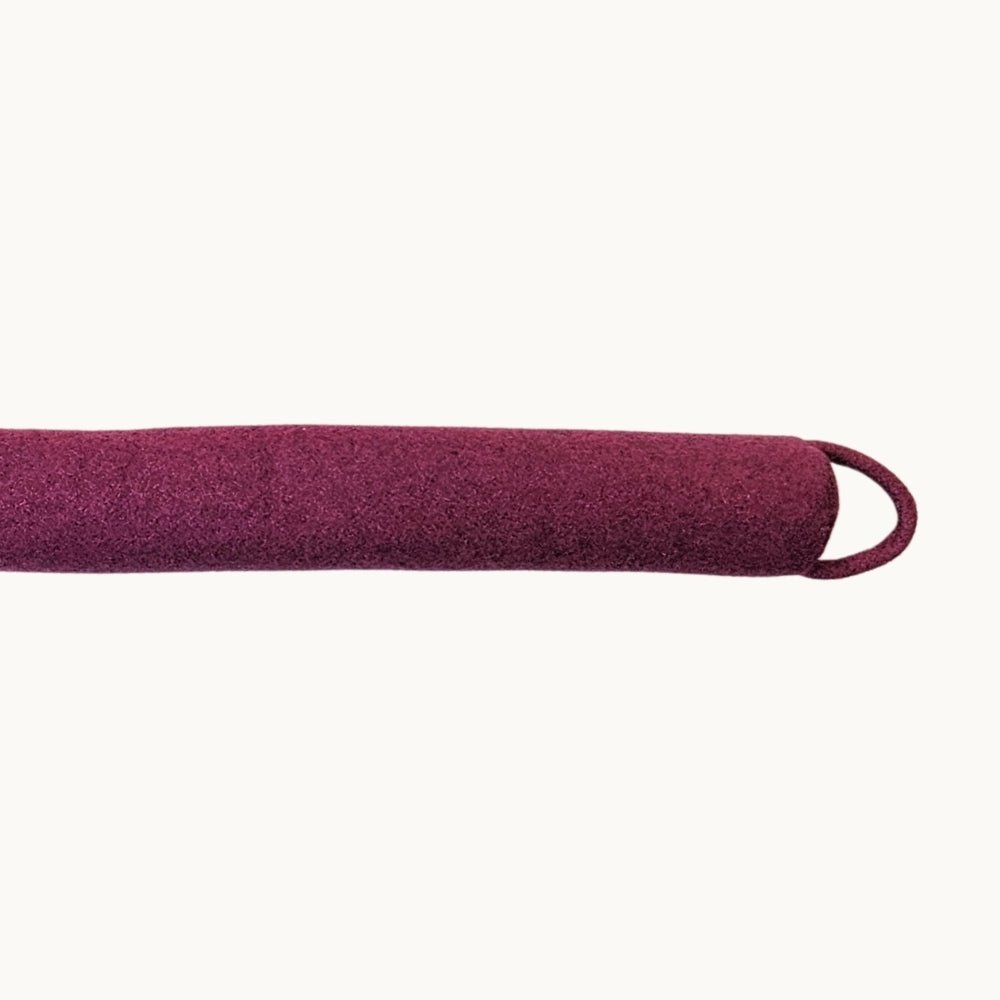 Felted NZ wool draught stopper by Do Not Disturb Sleep Company, designed to block cold air under doors.