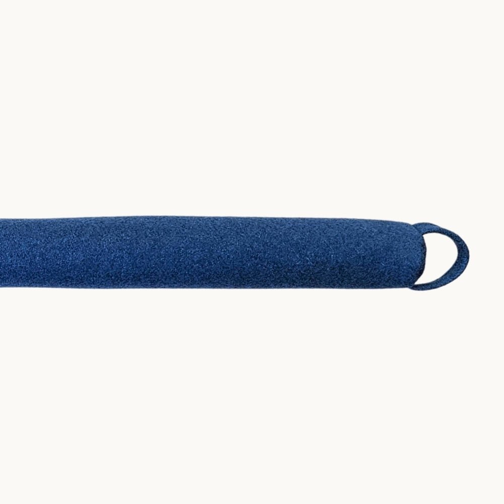 Felted NZ wool draught stopper by Do Not Disturb Sleep Company, designed to seal gaps and block cold drafts from doors or windows.