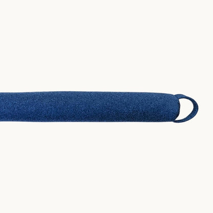 Felted NZ wool draught stopper by Do Not Disturb Sleep Company, designed to seal gaps and block cold drafts from doors or windows.