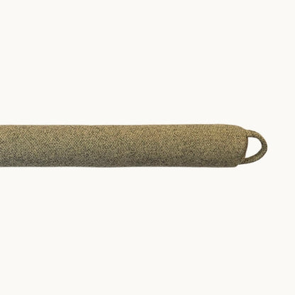 Felted NZ wool draught stopper by Do Not Disturb Sleep Company blocking door or window draft for energy efficiency and comfort.