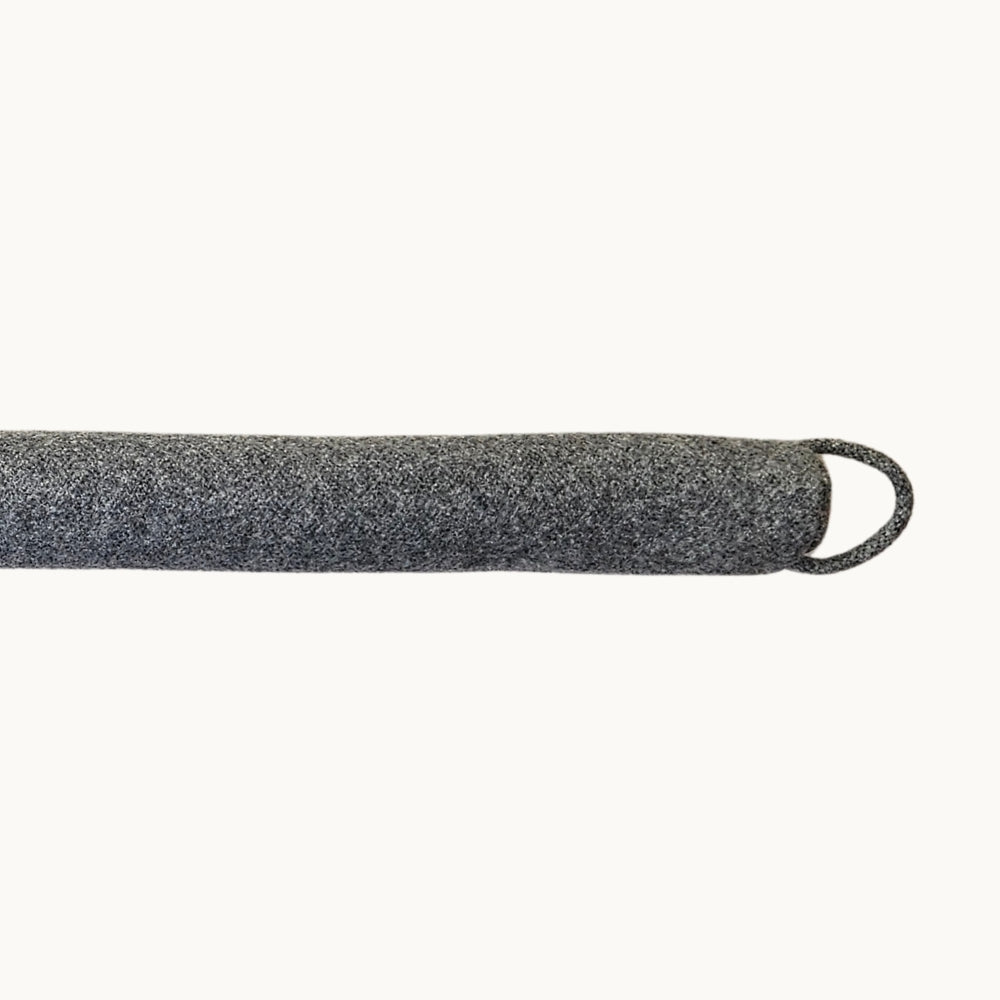 Felted New Zealand wool draught stopper by Do Not Disturb Sleep Company to seal door or window gaps and prevent drafts.
