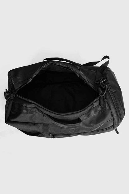 Black Fuaark Nz Elite Duffle Bag with sturdy handles and spacious main compartment for travel and gym use.