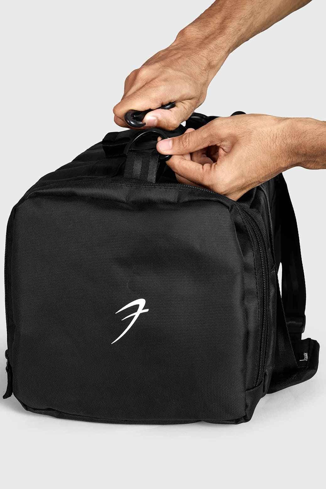 Black Elite Duffle Bag by Fuaark Nz, showcasing a spacious carry bag with sturdy handles and sleek design.