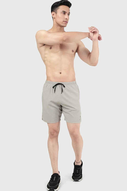 Beige 2-in-1 compression shorts by Fuaark Nz featuring a snug fit and stretchy fabric for active wear and support.