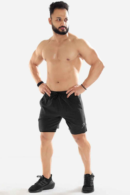 Dark grey 2-in-1 compression shorts by Fuaark Nz featuring a sleek design and comfortable fit for active wear.