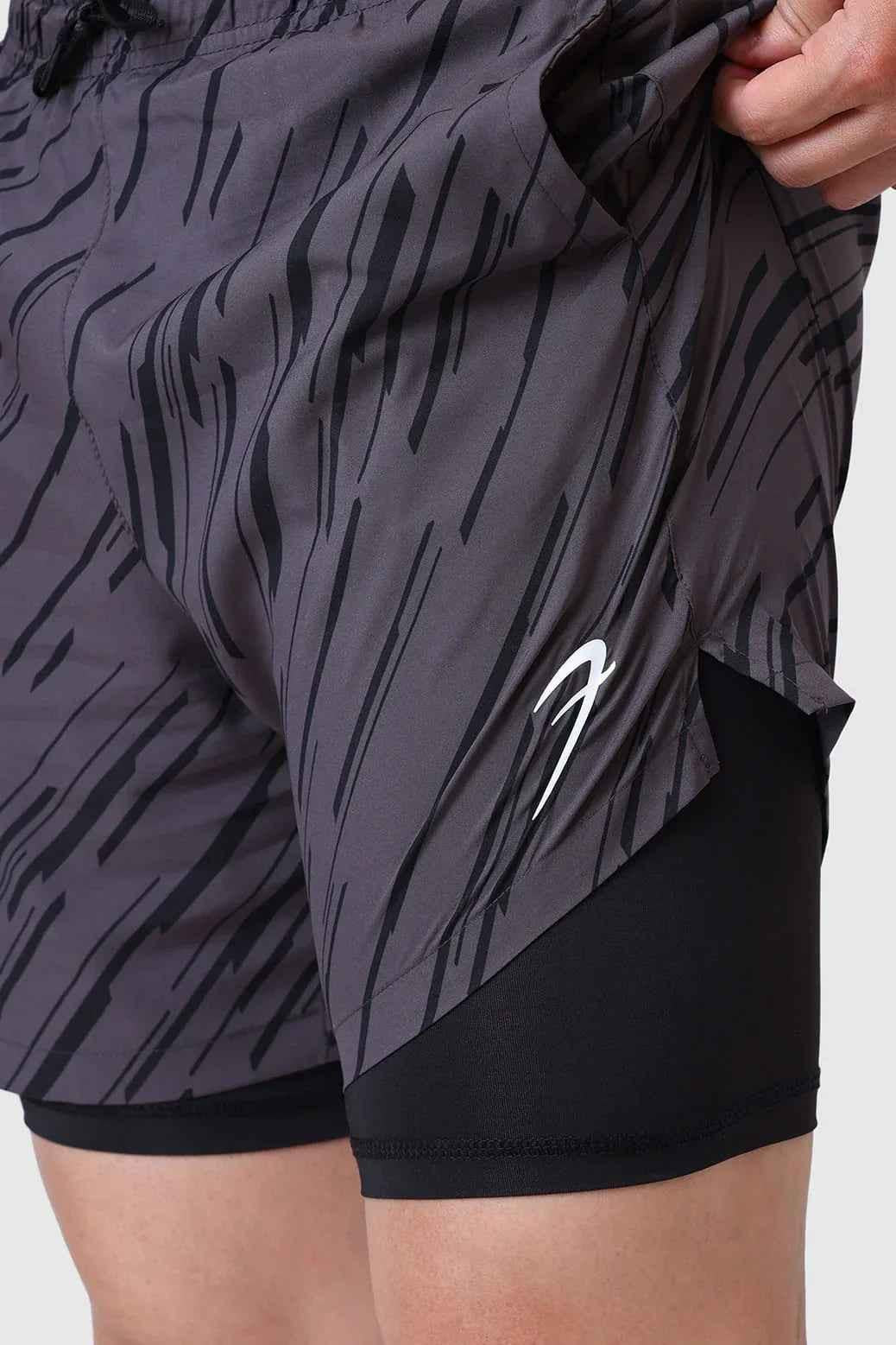 Fuaark Nz 2-in-1 printed graphite compression shorts with sleek design and flexible fit for athletic performance.
