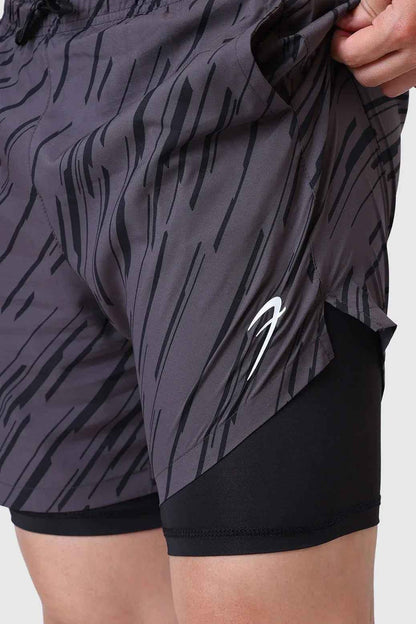 Fuaark Nz 2-in-1 printed graphite compression shorts with sleek design and flexible fit for athletic performance.
