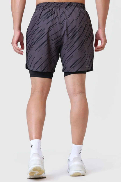 Fuaark Nz 2-in-1 printed compression shorts in graphite, featuring a sleek design and comfortable fit for active wear.