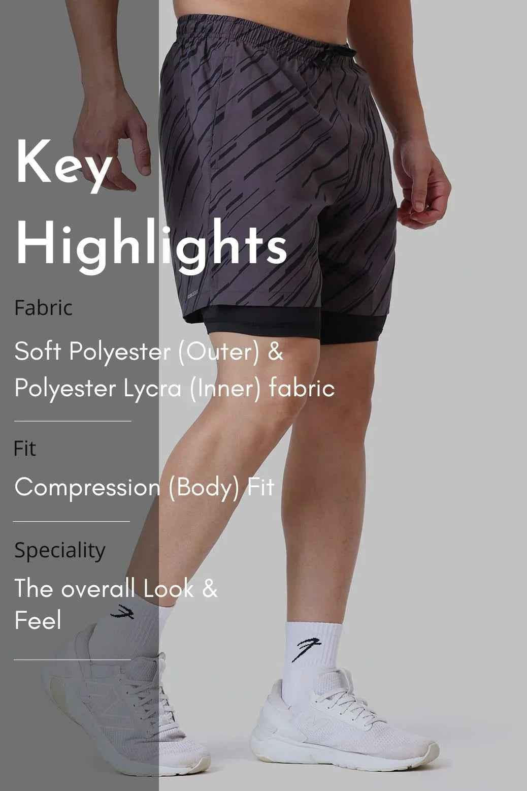 Fuaark Nz 2-in-1 printed compression shorts in graphite, featuring a sleek design and comfortable fit for active wear.