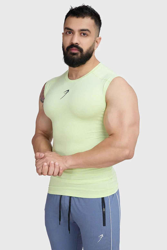 Lime green Fuaark NZ compression sleeveless tank top for athletic training and workout sessions.