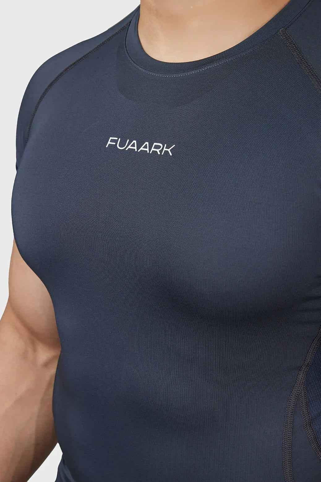 Grey Compression 2.0 T-shirt by Fuaark Nz, showcasing a fitted athletic t-shirt with sleek design and breathable fabric.
