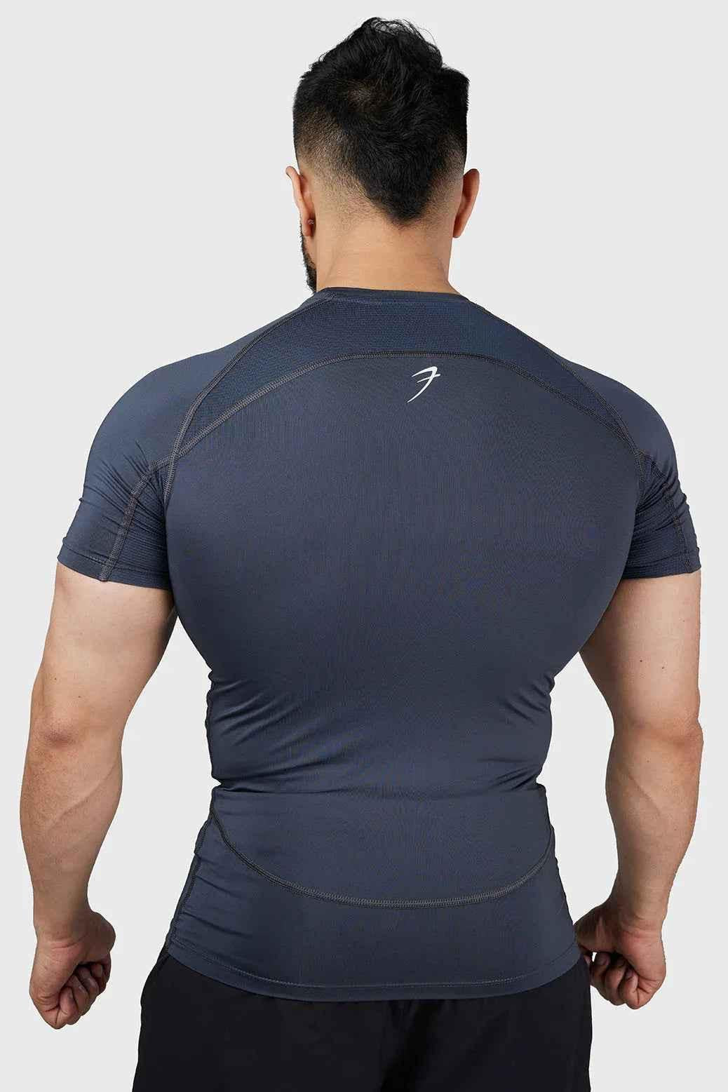 Grey Compression 2.0 T-shirt by Fuaark Nz, close-up of fitted, breathable fabric on a casual men's t-shirt.