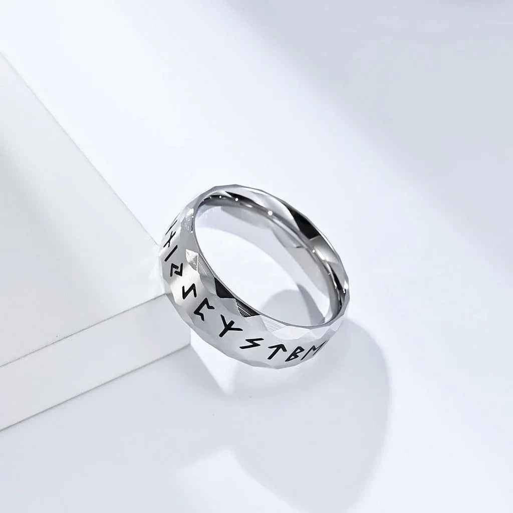 Stainless steel Viking Norse rune ring in silver by Glitters, featuring engraved Norse symbols on a sleek band