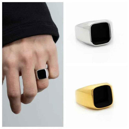 Black square flat top stainless steel signet ring by Glitters, showcasing a sleek silver finish with bold, modern design.