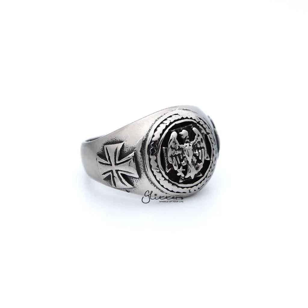 Men's antiqued stainless steel eagle casting rings by Glitters, featuring detailed eagle design and rugged finish.