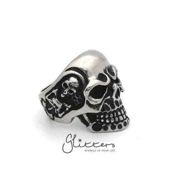 Stainless steel Gothic skull cast men's ring by Glitters featuring a detailed skull design on a sleek band.