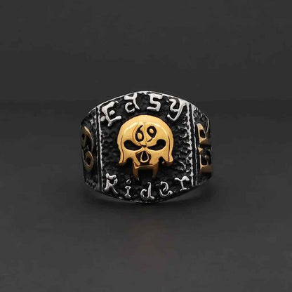 Stainless steel skull ring by Glitters featuring a detailed skull design, perfect for edgy jewelry style.