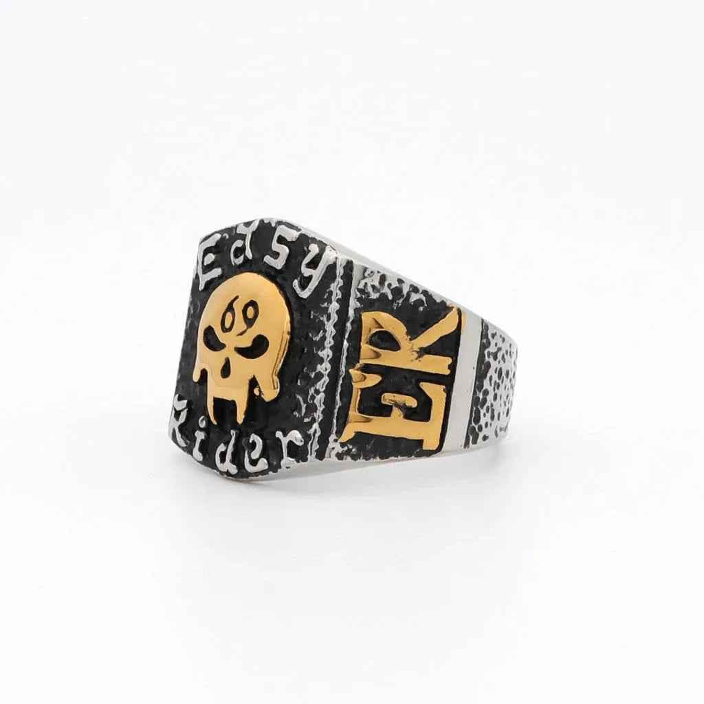 Stainless steel skull ring from Glitters featuring a detailed skull design on a polished silver band.