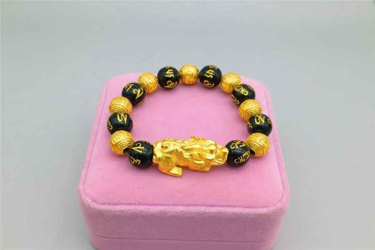 Gold Bracelet with Black Beads
