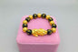 Gold Bracelet with Black Beads