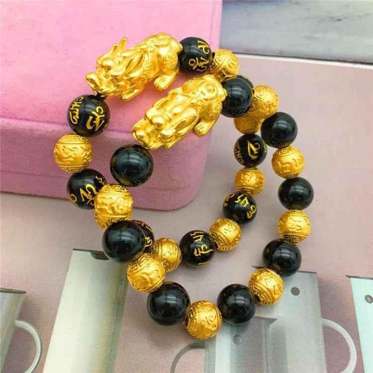 Gold Bracelet with Black Beads