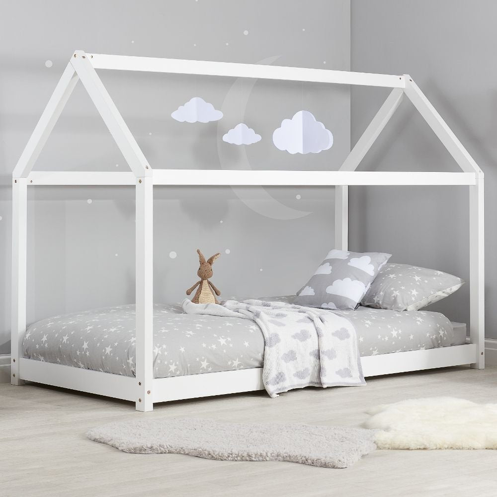 White single Hannigan kid bed frame by sue-e furniture, featuring a sturdy wooden design with a slatted headboard and clean finish.