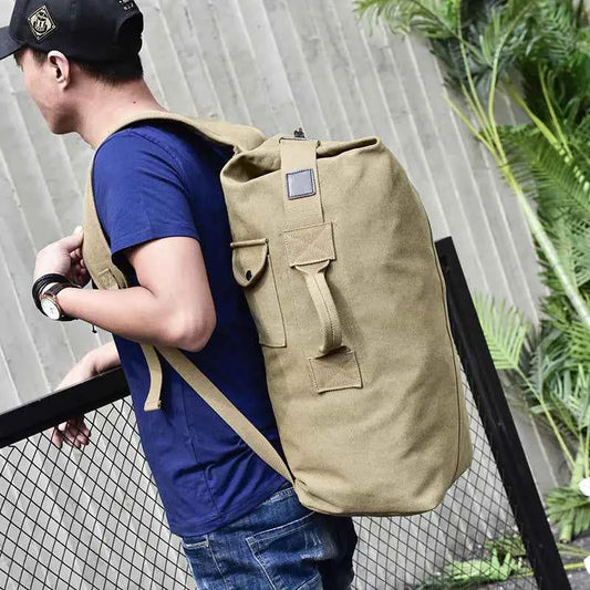 Mead's Supply waterproof canvas hiking backpack with high capacity, outdoor adventure rucksack, available in two sizes, outdoors-ready design.