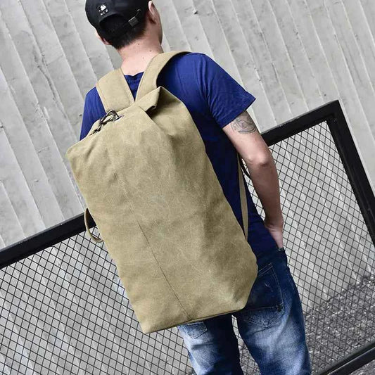 Waterproof canvas hiking backpack by Mead's Supply & Equipment Outfitters, high-capacity outdoor adventure travel rucksack in two sizes.