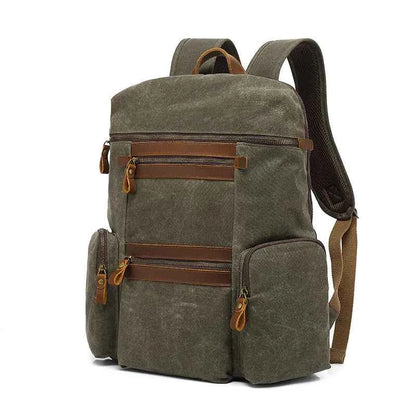 Mead's Supply waterproof waxed canvas travel laptop backpack in army green with soft cotton lining, 20-35L size, sturdy and stylish.