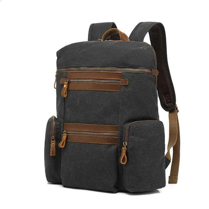 Army green Mead's Supply waterproof waxed canvas travel backpack with soft cotton lining, 20-35L computer bag for laptops.