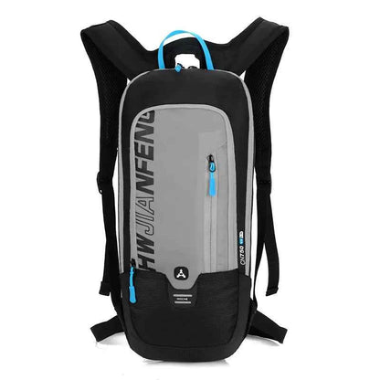 Grey outdoor hydration backpack with integrated water bladder, lightweight cycling and trail running pack by Mead's Supply & Equipment.