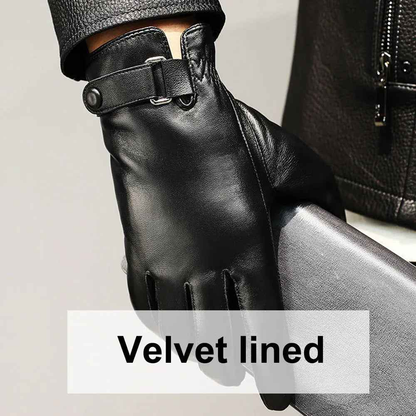 Black leather gloves with velvet lining from Mead's Supply & Equipment Outfitters, showing close-up of the textured leather surface.