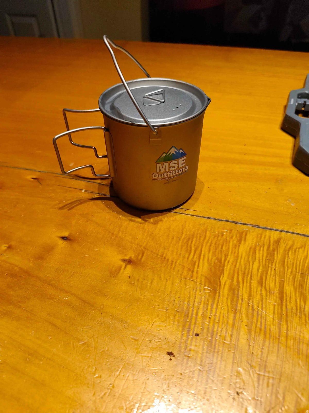 Titanium camping cookware pot, 750ml capacity, ultralight design by Mead's Supply & Equipment Outfitters for outdoor camping.