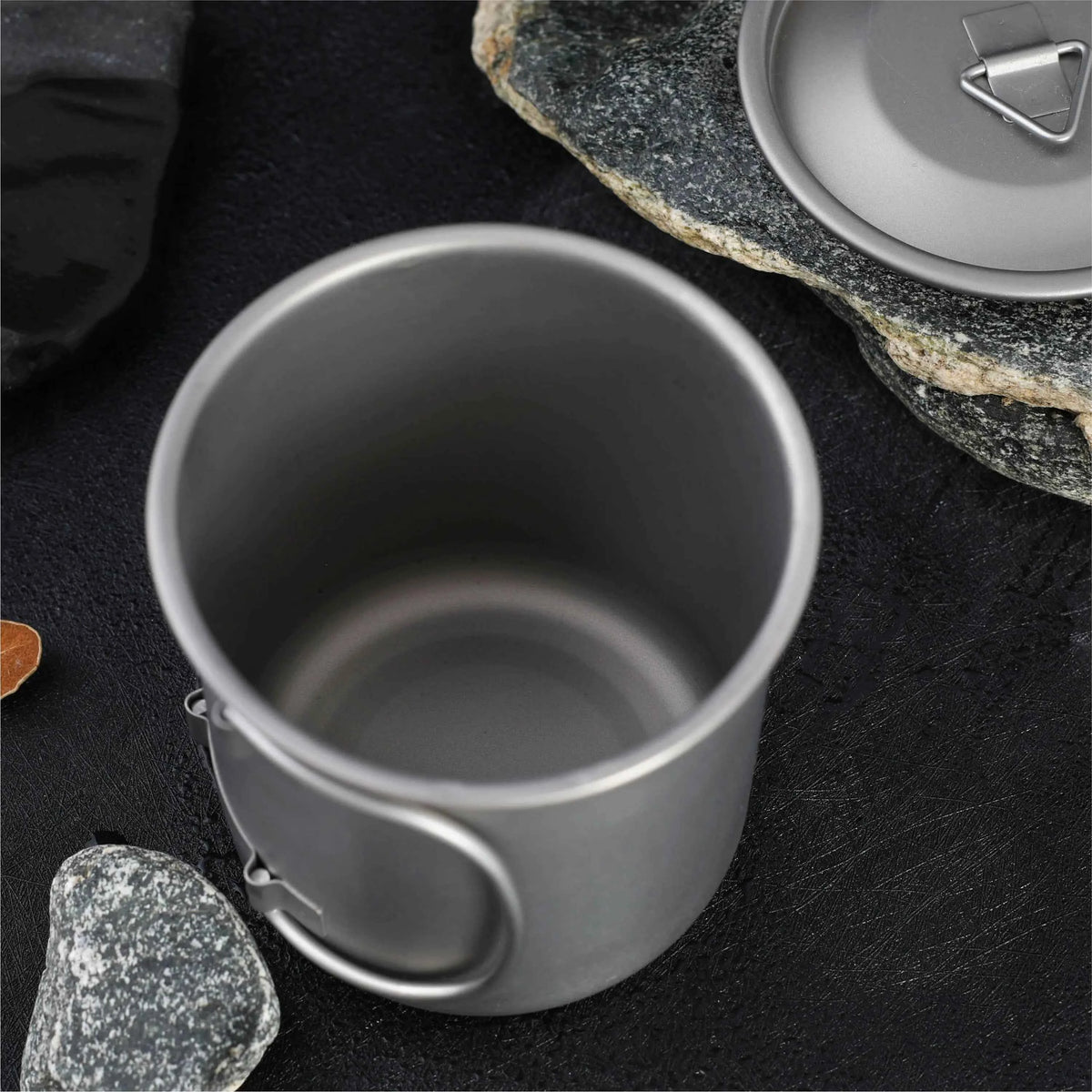 Titanium folding camping cup with lid, lightweight and collapsible travel mug for outdoor camping and hiking by Mead's Supply & Equipment