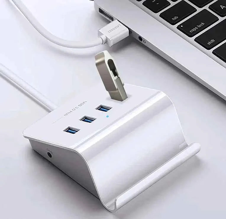 White 16GB metal USB flash drive for mobile phones, branded by Mead's Supply & Equipment Outfitters, electronics accessory.