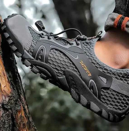 Black waterproof river trekking shoes by Mead's Supply & Equipment Outfitters, featuring non-slip soles for hiking and wading.