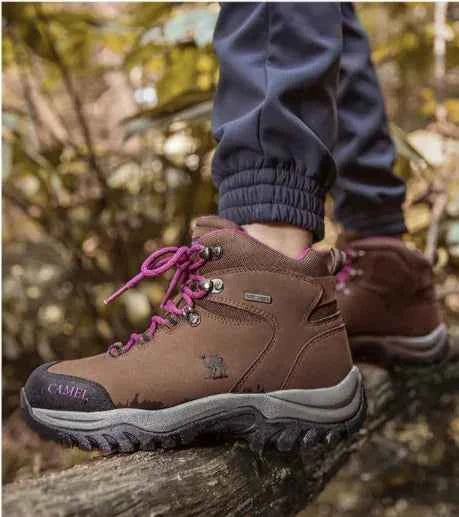 Purple waterproof high-top hiking boots for girls by Camel brand, made by Mead's Supply & Equipment Outfitters.