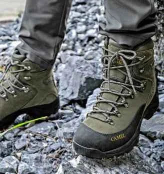 Purple waterproof high-top hiking boots for girls by Camel Brand, made by Mead's Supply & Equipment Outfitters, designed for outdoor adventures.