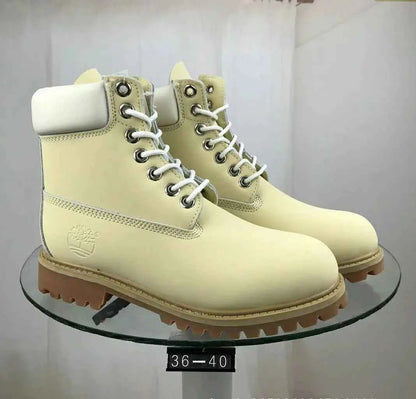 Navy blue Mead's Supply waterproof leather work boots with slip-resistant soles, designed for work and trail use, unisex footwear.