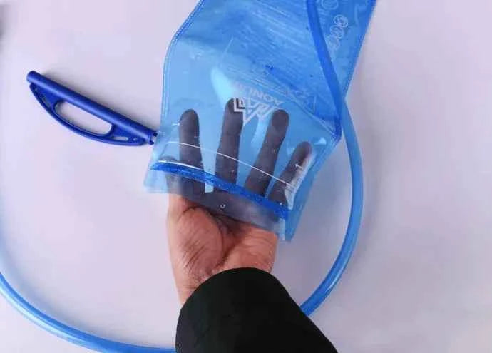 Blue Mead's Supply hydration bladder 2L water bag for sports, with a flexible tube and mouthpiece for hydration during activities.