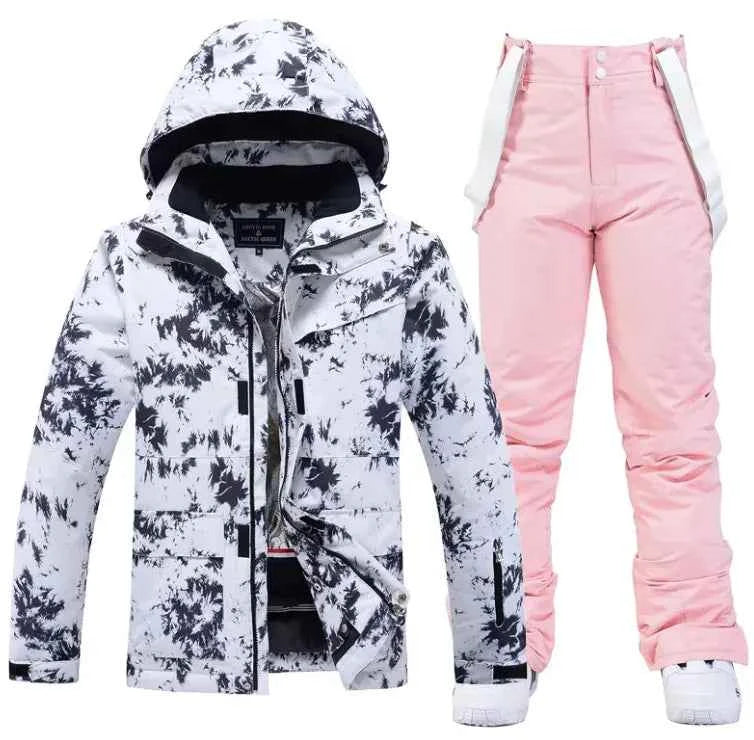 Pink men's and women's waterproof windproof ski suit by Mead's Supply & Equipment, featuring jacket and pants for winter snow sports.