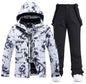 Pink men's and women's waterproof windproof ski suit by Mead's Supply & Equipment Outfitters, featuring a 2-piece winter snow set.