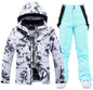 Pink men's and women's waterproof windproof ski suit by Mead's Supply & Equipment, featuring a 2-piece winter snow ski set.