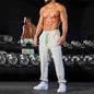 Men's black athletic joggers with side stripe, Mead's Supply & Equipment Outfitters limited men's track sweatpants for active wear.